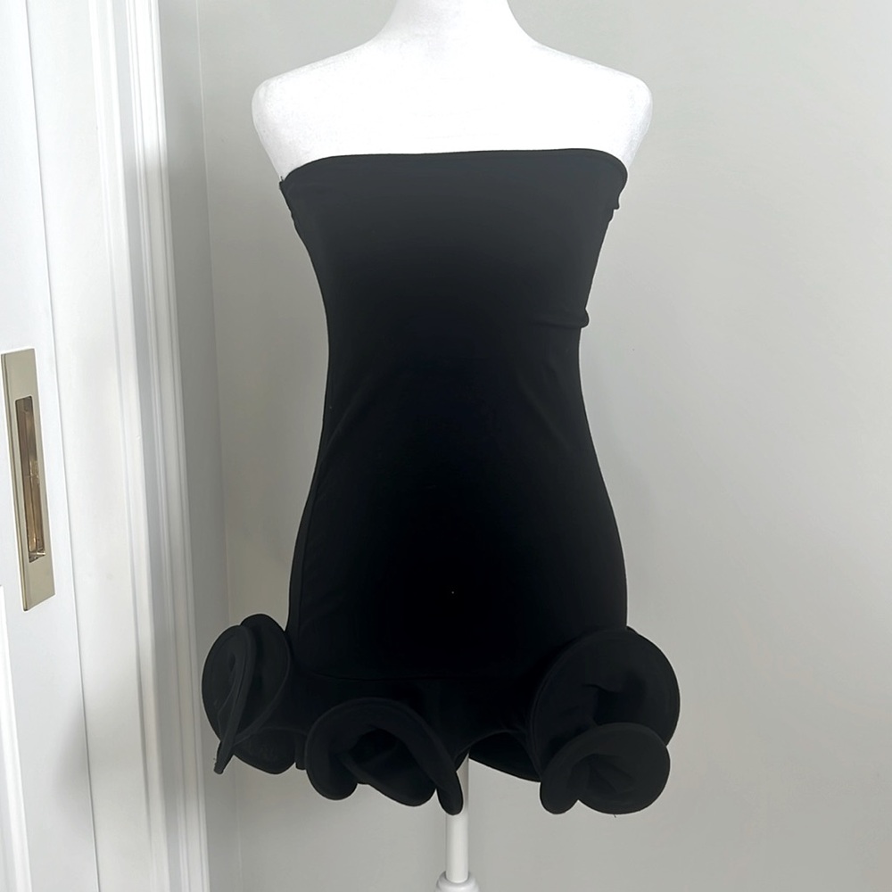 Black stretchy MAISON dress with detail on the bottom